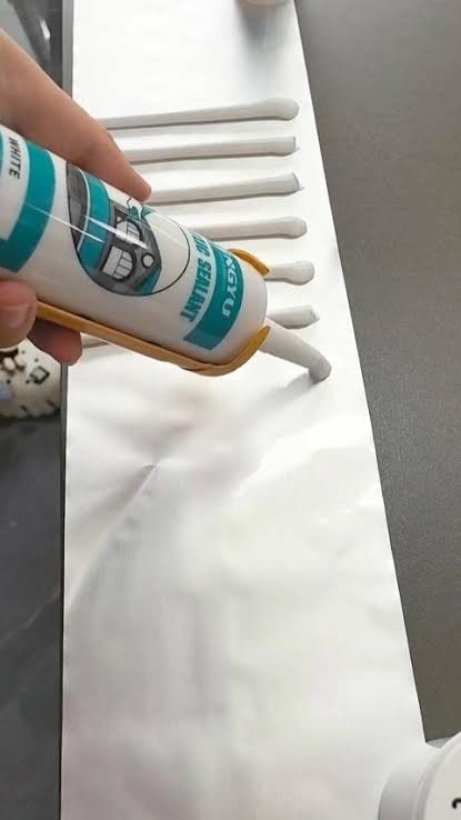 M812-Highly flexible pure acrylic 49-51% solids.